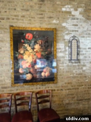 Vinci Chicago: A Scrumptious Valentine's Celebration 4 Cozy dining area with vintage Italian ceramics and frescoes at Vinci Chicago