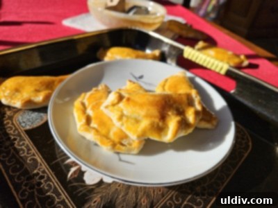 Baked Cantonese Sweet Dumplings (Gok Zai) arranged on a plate