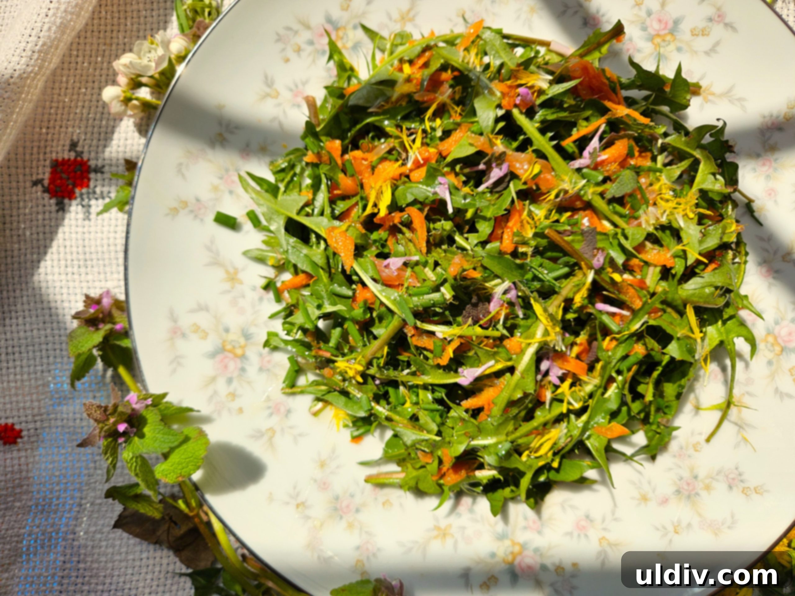 Dandelion Dining Reimagined 2 A vibrant spring salad featuring fresh dandelion greens, bright grapefruit, and other colorful vegetables.