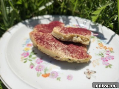 Cross-section of a lilac sugar cookie, revealing its texture