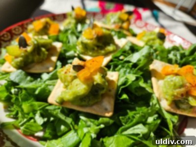 May's Top Product Picks 4 Schär Gluten Free Table Crackers canapés with guacamole, bell peppers, and pumpkin seeds.