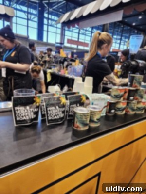 Exploring the 2024 Specialty Coffee Expo: My Takeaways 27 Barista preparing coffee at Roaster Village