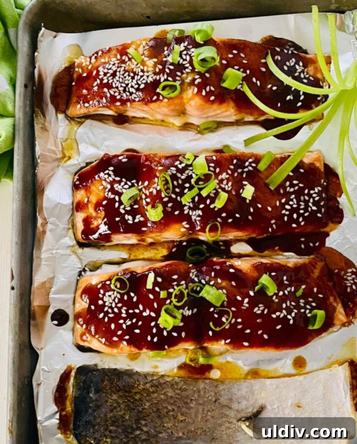 Glazed Teriyaki Salmon 3 Three pieces of raw salmon fillets, showcasing the quality of fish for the recipe.