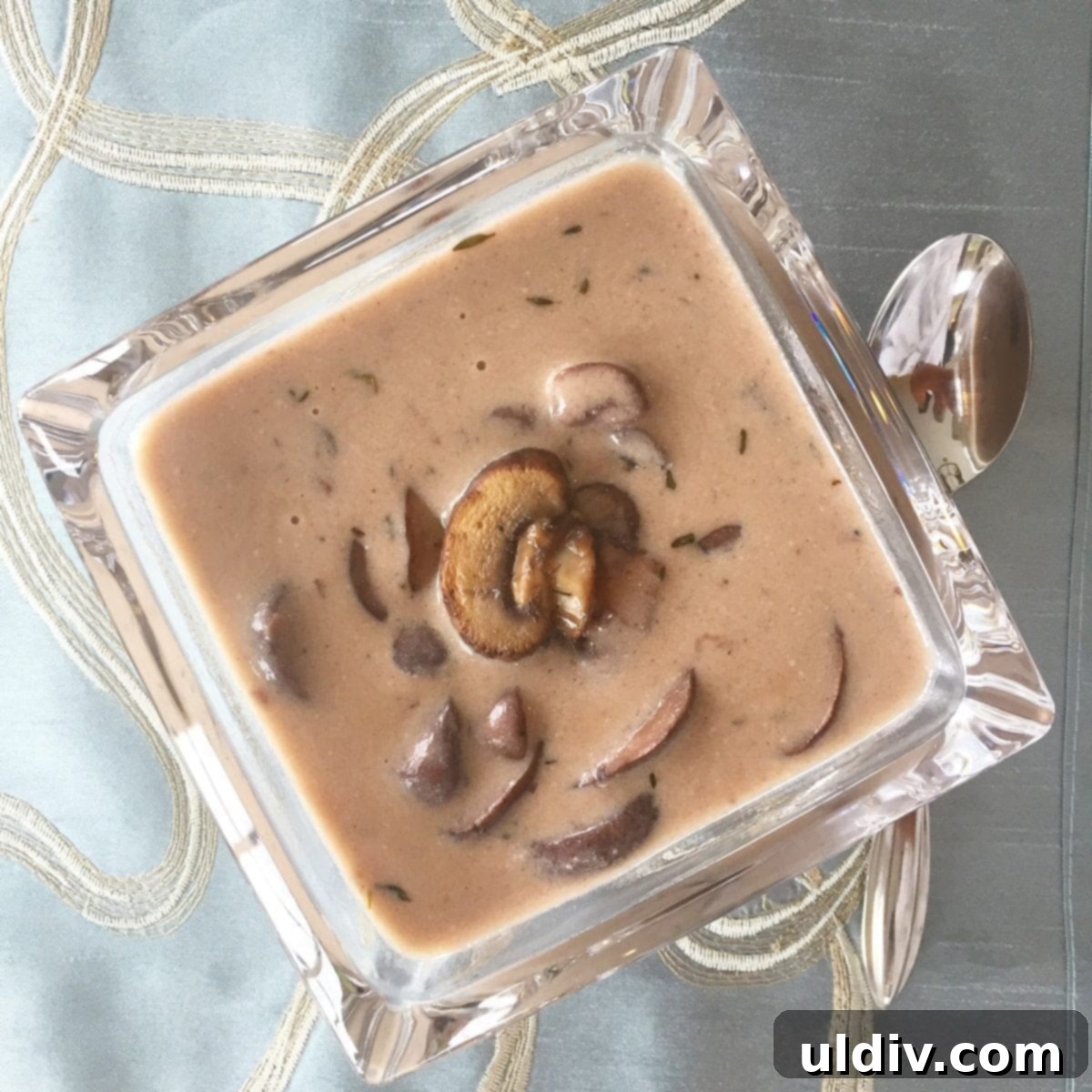 Velvety Gluten-Free Mushroom Comfort 2 single serving of cream of mushroom soup in a glass bowl