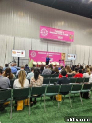 People enjoying treats at the Sweets & Snacks Expo