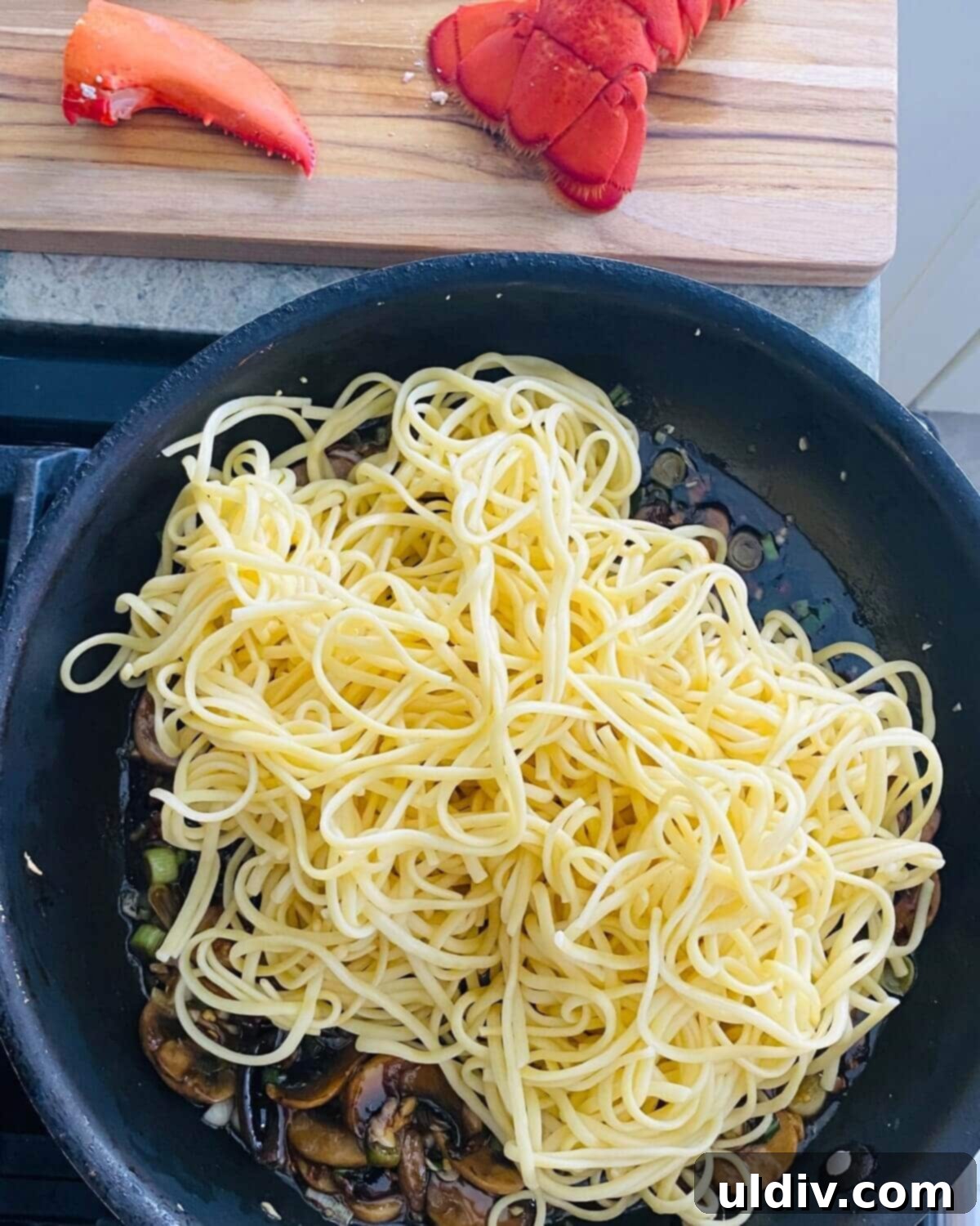 Decadent Garlic Lobster Noodles 9 add noodles to stir fry.