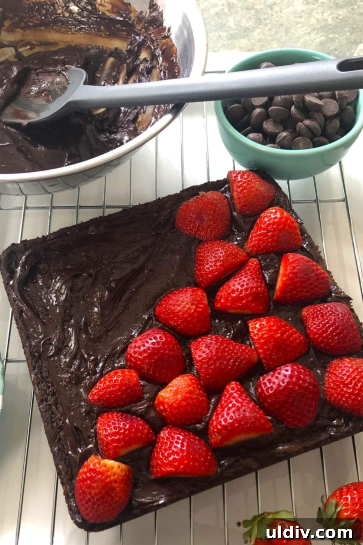 Ultra-Fudgy Chocolate Strawberry Brownie Bliss 8 Cool brownies topped with a layer of freshly sliced bright red strawberries, before the final ganache layer.