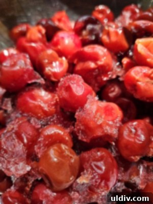 Mastering Sour Cherries From Pit to Preserve 4 A close-up of pitted sour cherries in a bowl, ready for cooking.