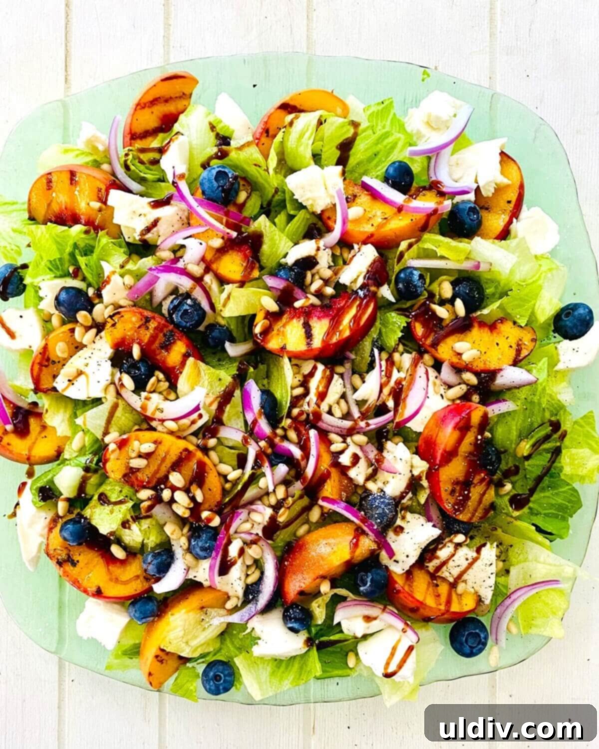 Sweet and Savory Grilled Peach Mozzarella Salad 9 grilled peach salad with blueberries.