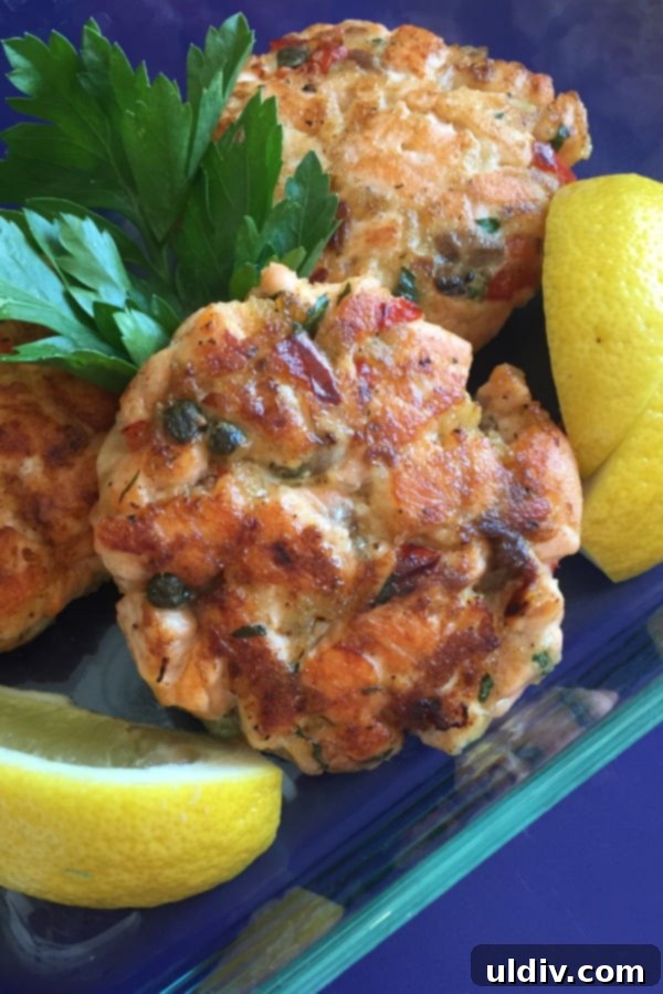 Crispy Salmon & Caper Patties 2 sauteed salmon cakes with lemon wedges