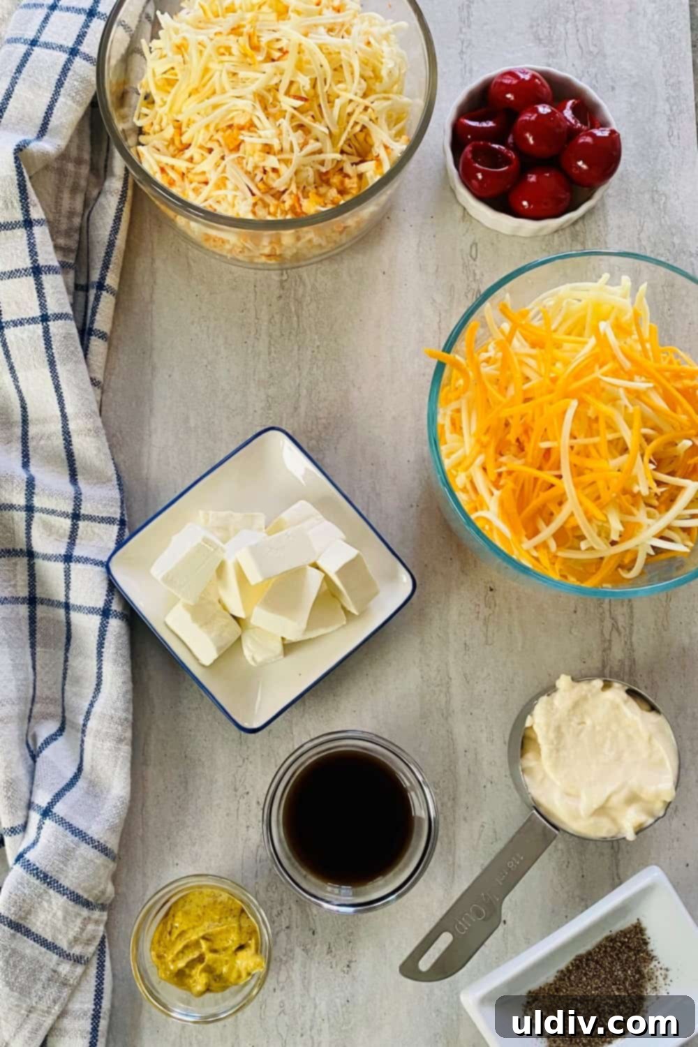 Southern Comfort Homemade Pimento Cheese 3 Ingredients for homemade pimento cheese including shredded cheese, cream cheese, and peppadew peppers
