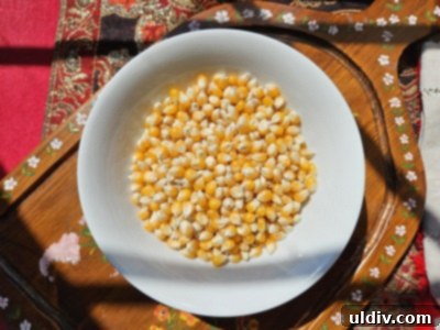 Unlock the Secret to Perfect Homemade Popcorn 4 Close-up of fluffy, freshly popped kernels in a bowl.