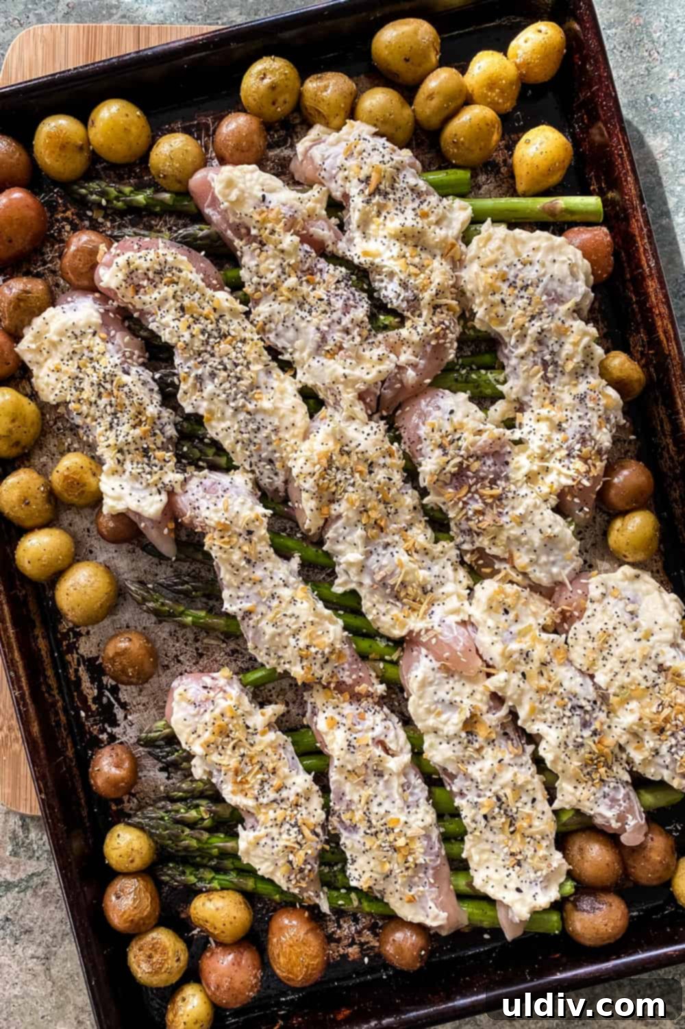 Easy Everything Bagel Chicken Bake 6 chicken tenderloins coated with Parmesan mayonnaise and everything bagel seasoning
