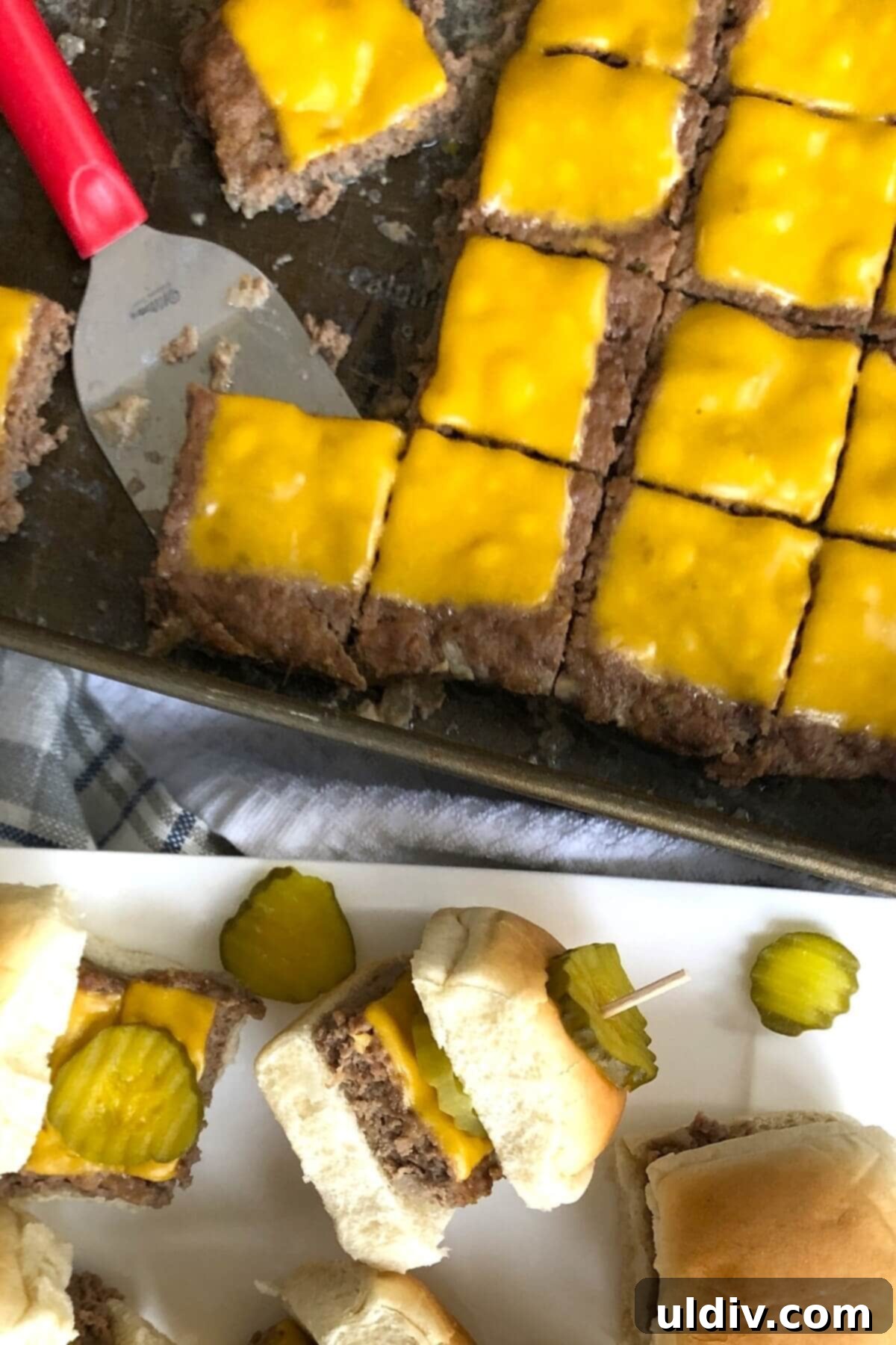 Ultimate Crowd-Pleasing Cheeseburger Sliders 3 Two rows of cheeseburger sliders, one with buns and one without, highlighting the uniform size and melted cheese.