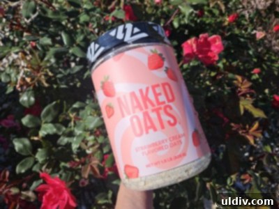 Creamy Strawberry Protein Bliss 3 The dry mix of Naked Strawberry Cream Protein Oats, showing freeze-dried strawberry pieces