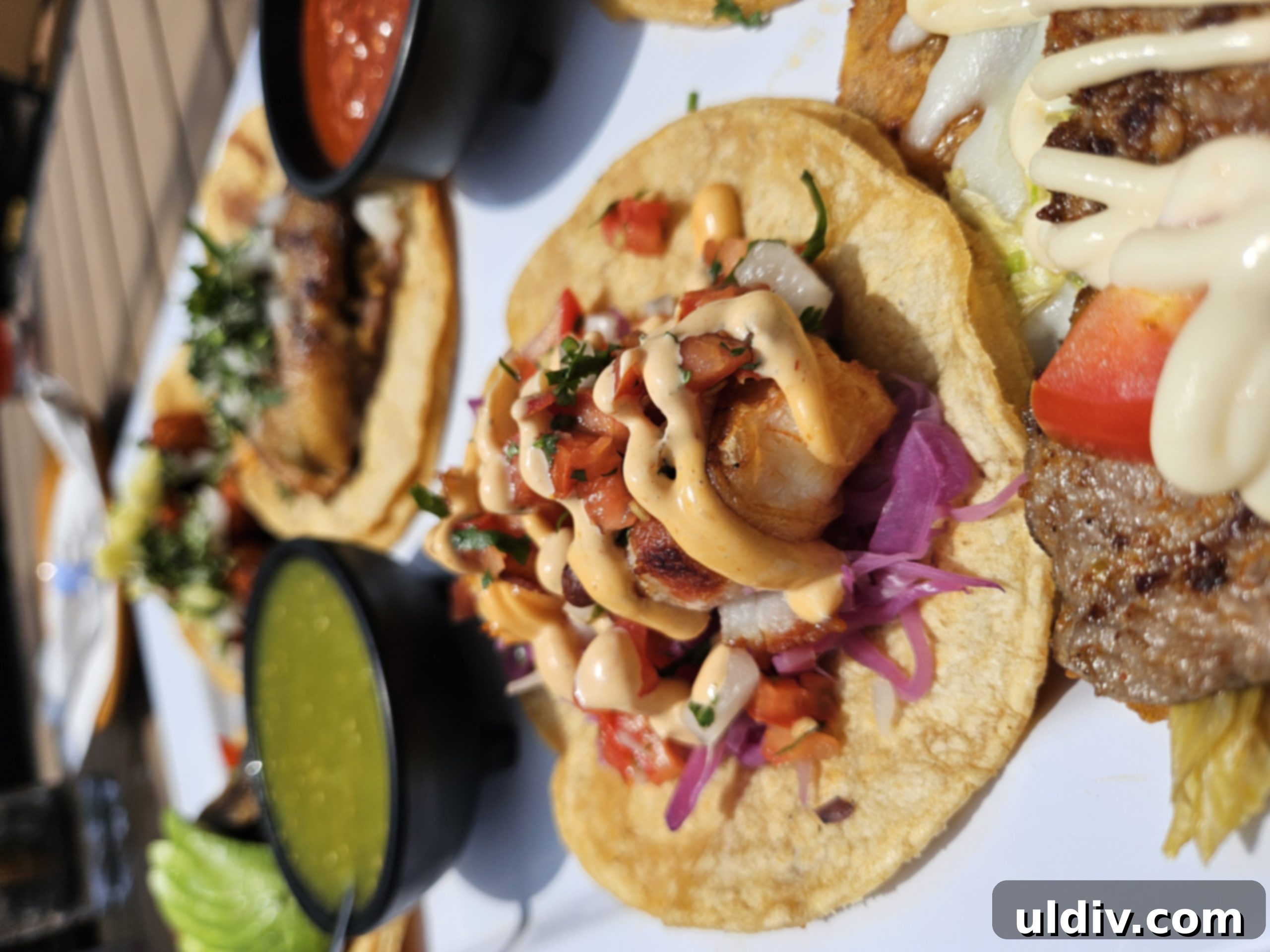 Chicago's Tatas Tacos: An Unmissable Flavor Journey 2 Delicious tacos from Tatas Tacos, showcasing vibrant colors and fresh ingredients.