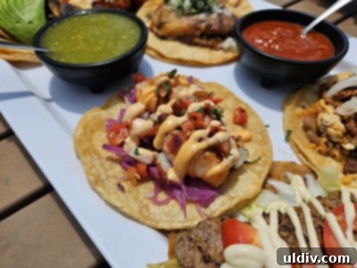 Chicago's Tatas Tacos: An Unmissable Flavor Journey 6 A taco flight at Tatas Tacos, featuring a colorful array of various tacos.