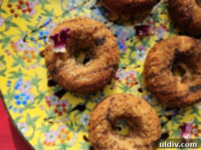 Beyond the Spoon: Creative Ways to Use Blackstrap Molasses 3 Close-up of freshly baked pumpkin donuts, elegantly drizzled with rich, dark blackstrap molasses, highlighting its natural sweetness and nutritional value.