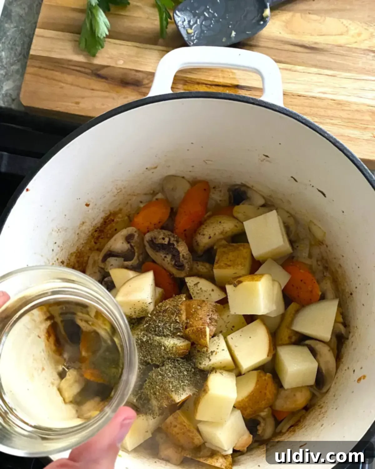 Smoky Pork Tenderloin and Bacon Stew 7 Adding white wine to pork stew.