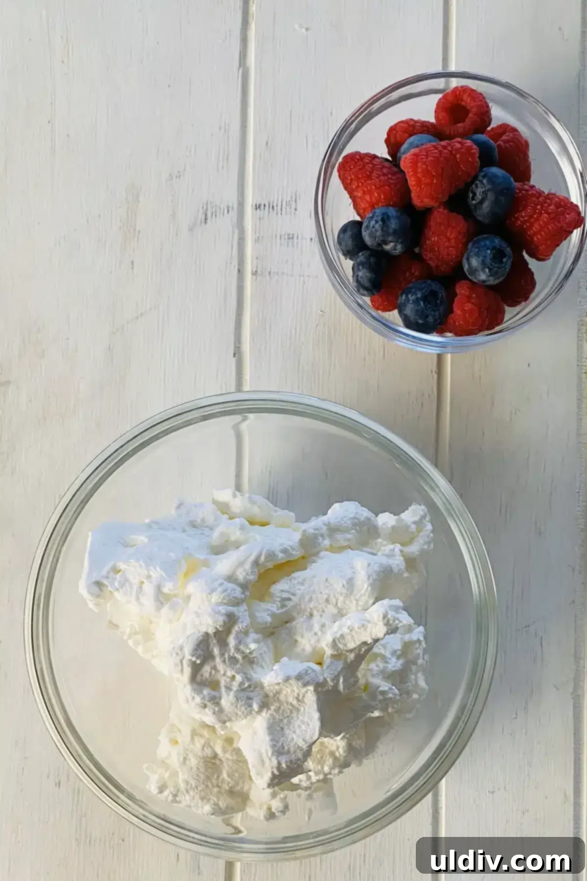 Simple Philadelphia No-Bake Cheesecake Bites 5 Homemade whipped cream and berries.