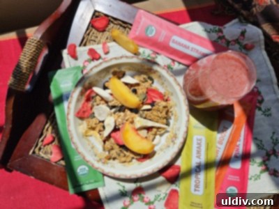 Healthy Bites and Beyond 13 Breakfast bowl with sourdough granola, fresh peaches, Natierra freeze-dried fruits, and a smoothie