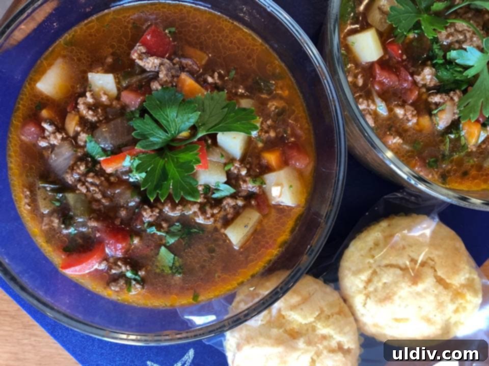 Hearty Hamburger and Potato Soup, a comforting and robust meal in a bowl.