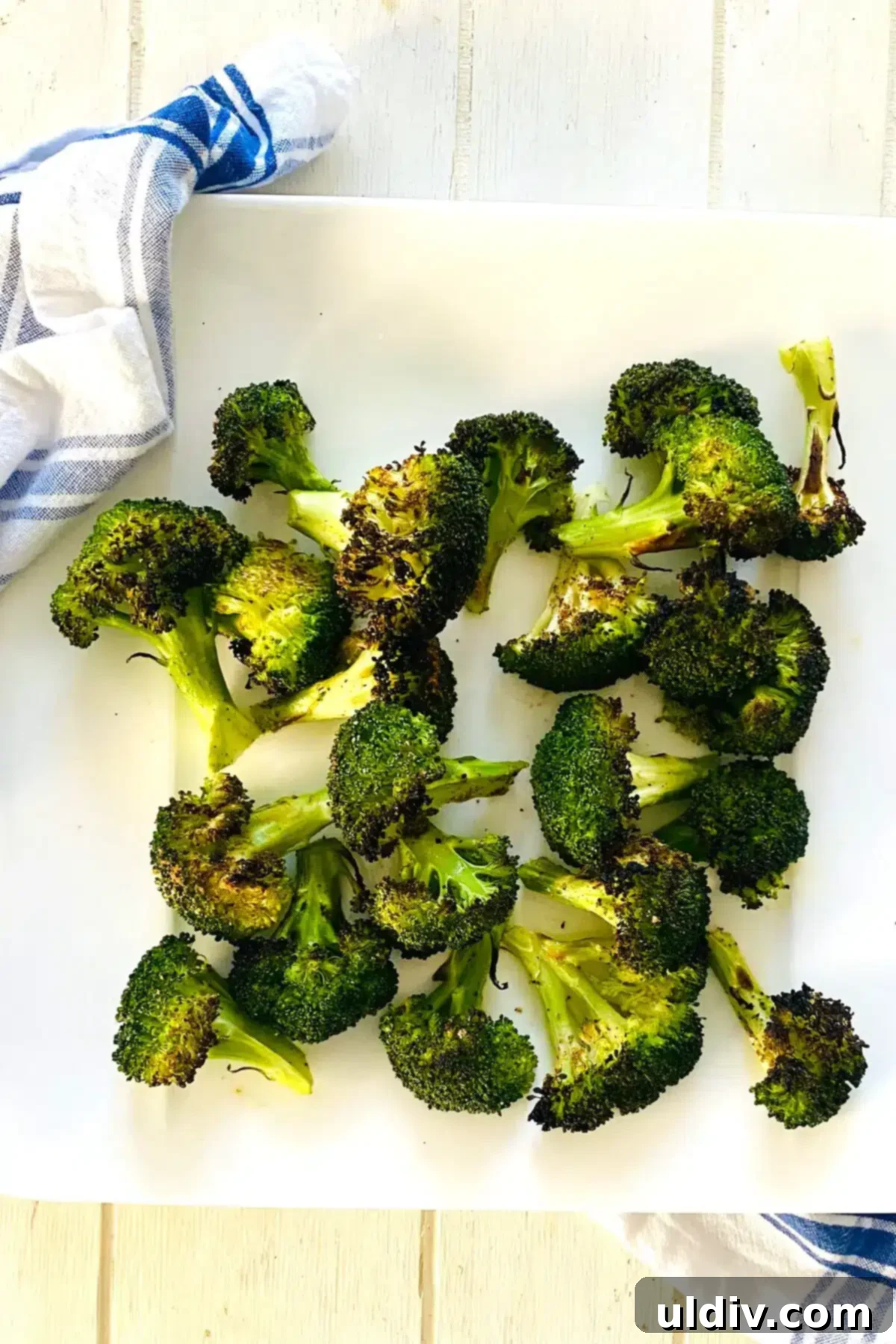 Golden Garlic Crispy Broccoli 3 platter of broiled broccoli.