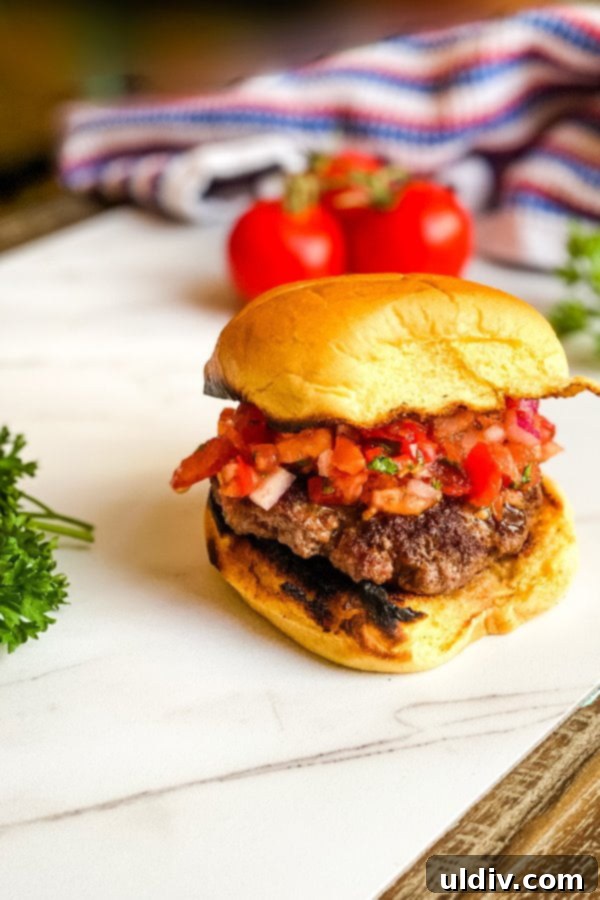 Garden Fresh Tomato Relish Burgers 7 Another view of a grilled burger on a bun with fresh tomato relish, highlighting its fresh appeal.