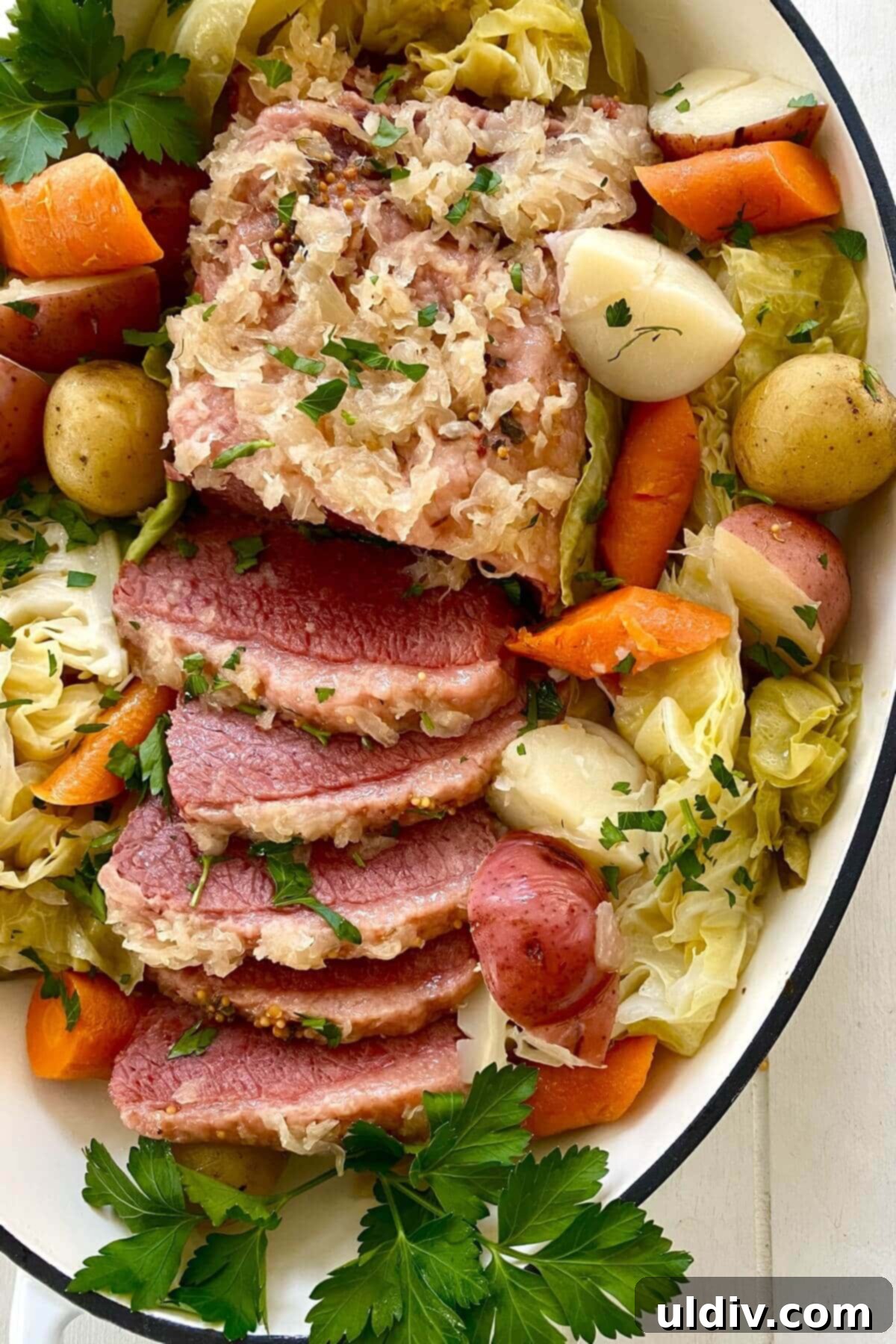 Perfectly Tender Instant Pot Corned Beef and Cabbage 2 A platter of instant pot corned beef and cabbage.
