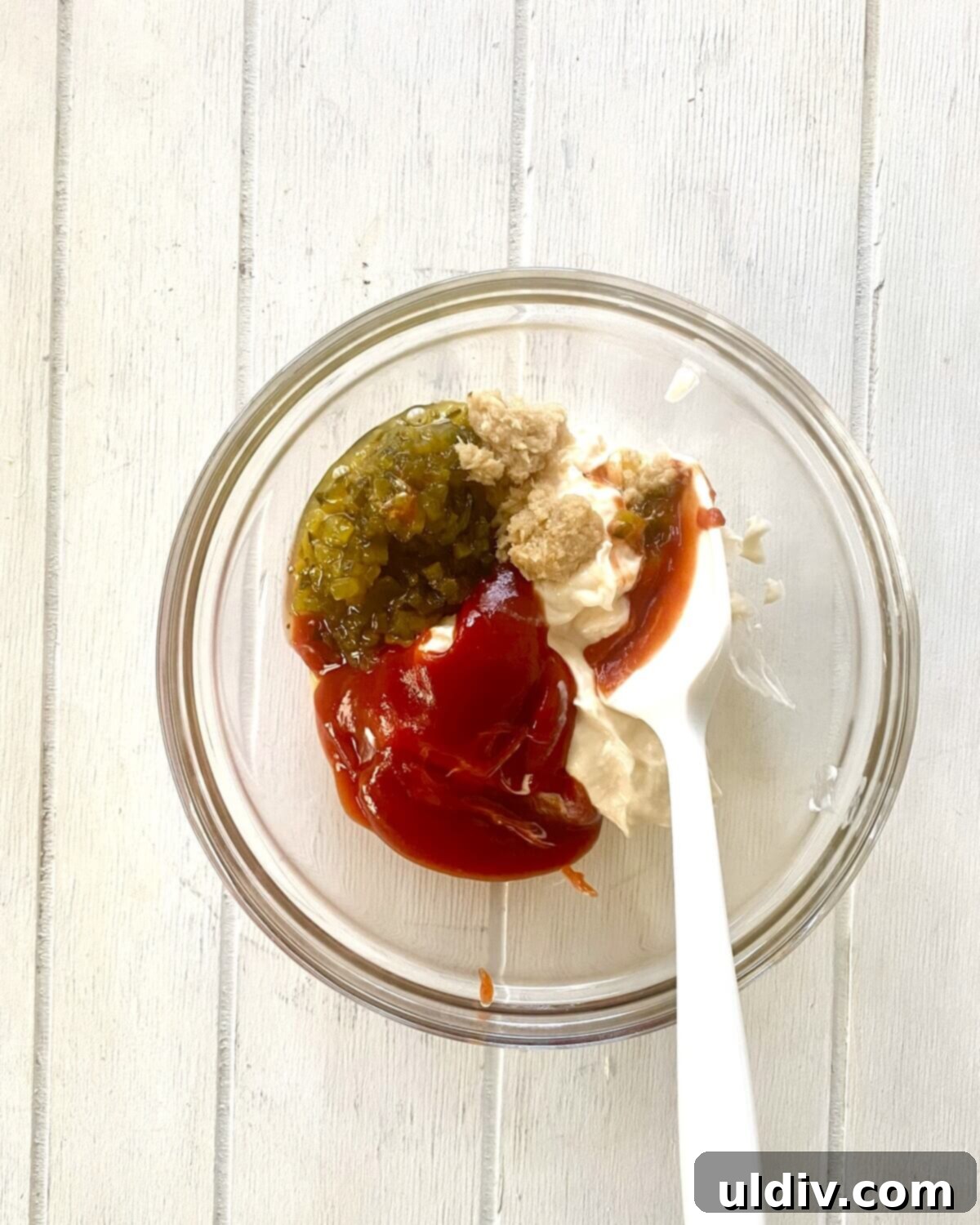 Irish Tacos: The Corned Beef & Cabbage Twist 5 Ingredients for Russian dressing: mayonnaise, ketchup, sweet pickle relish, and horseradish combined in a bowl.