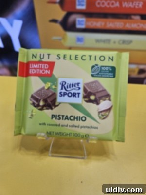 Unwrapping the 2025 Sweets & Snacks Expo 11 A vibrant display of various Dubai chocolate-inspired products, including bars and confections, demonstrating the widespread adoption of the trend.