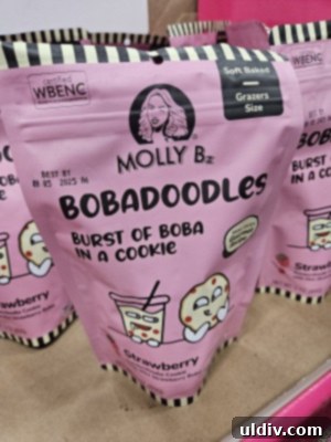 Unwrapping the 2025 Sweets & Snacks Expo 12 Molly Bz Cookies' innovative Bobadoodles, shortbread cookies enhanced with mini strawberry boba, showcasing a newstalgic blend.