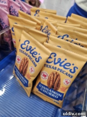 Unwrapping the 2025 Sweets & Snacks Expo 14 Evie’s Texas Pecans in Cinnamon Churro flavor, a delightful fusion representing the newstalgia trend in snacking.