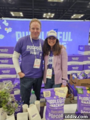 Unwrapping the 2025 Sweets & Snacks Expo 20 Matthew and Jasmin von Teichman, the passionate founders of Purplesful popcorn, at their Expo booth.