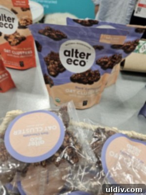 Unwrapping the 2025 Sweets & Snacks Expo 24 The Alter Eco booth, showcasing their range of organic and ethically sourced chocolate products.