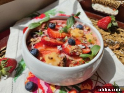 Serving Up Wimbledon's Best Bites 2025 6 Close-up of a refreshing strawberry smoothie bowl with an array of fresh fruit and crunchy granola