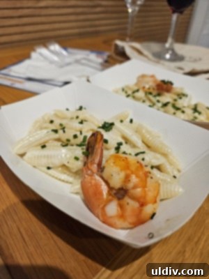 Eataly 2025 Summer Saturdays Collection 9 Close-up of perfectly cooked pasta strands in a creamy sauce