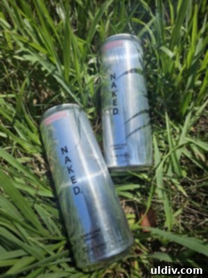 The Naked Truth About Sparkling Energy 3 Three cans of Naked Sparkling Energy drinks in Lemonade, Orange, and Strawberry Lemonade flavors