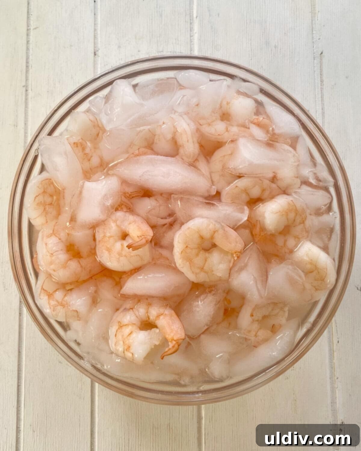 Effortless Old Bay Shrimp Salad 7 Cooked shrimp immediately transferred into an ice bath to stop the cooking process.