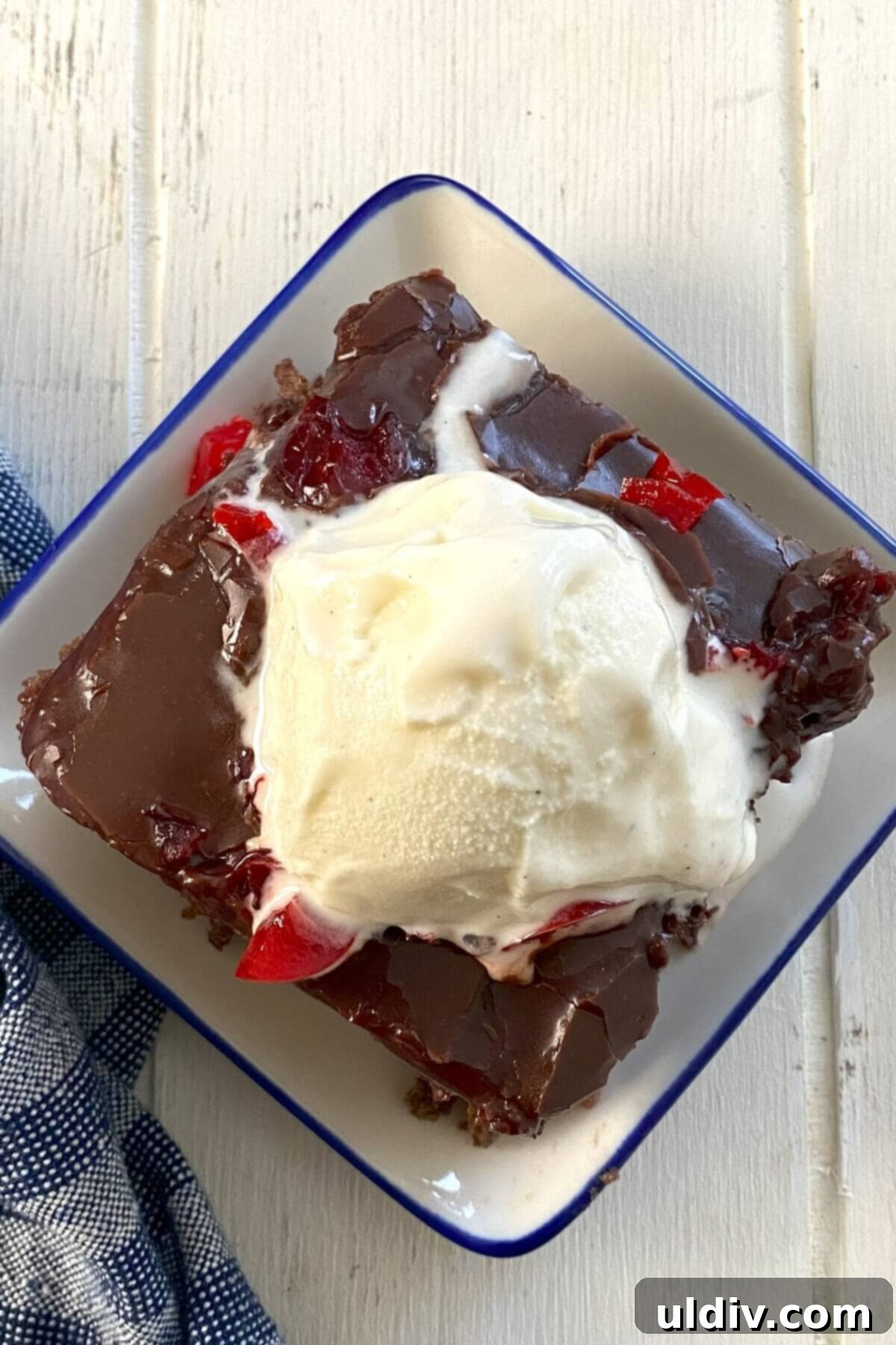 Melty ice cream on chocolate cake.