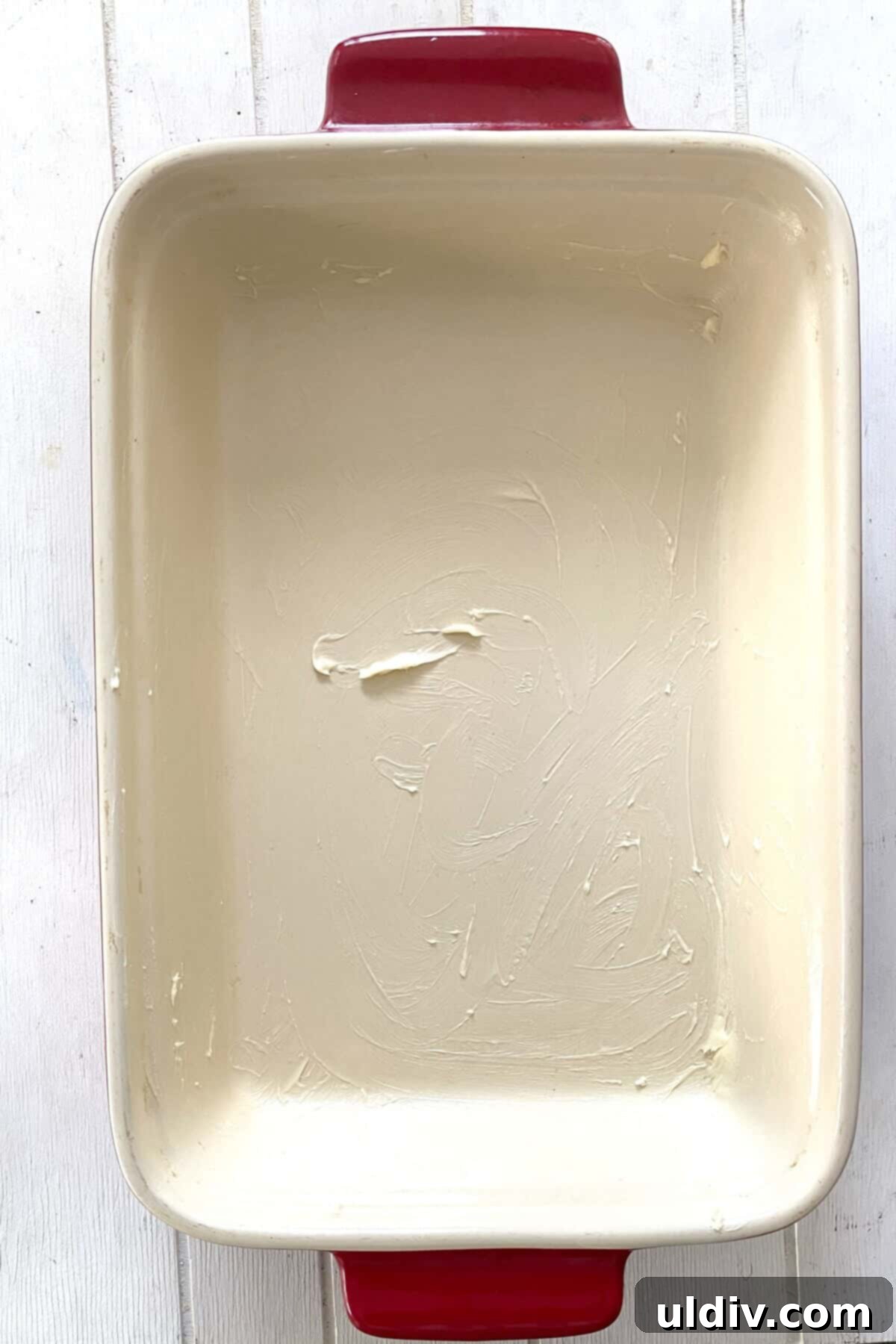 A buttered baking dish.