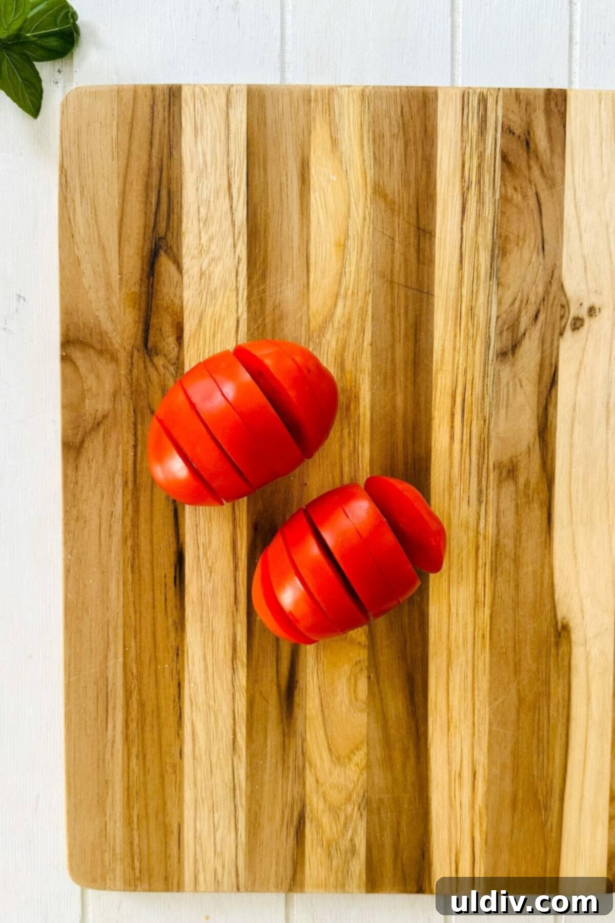 Caprese Stuffed Tomatoes 4 a sliced tomato.