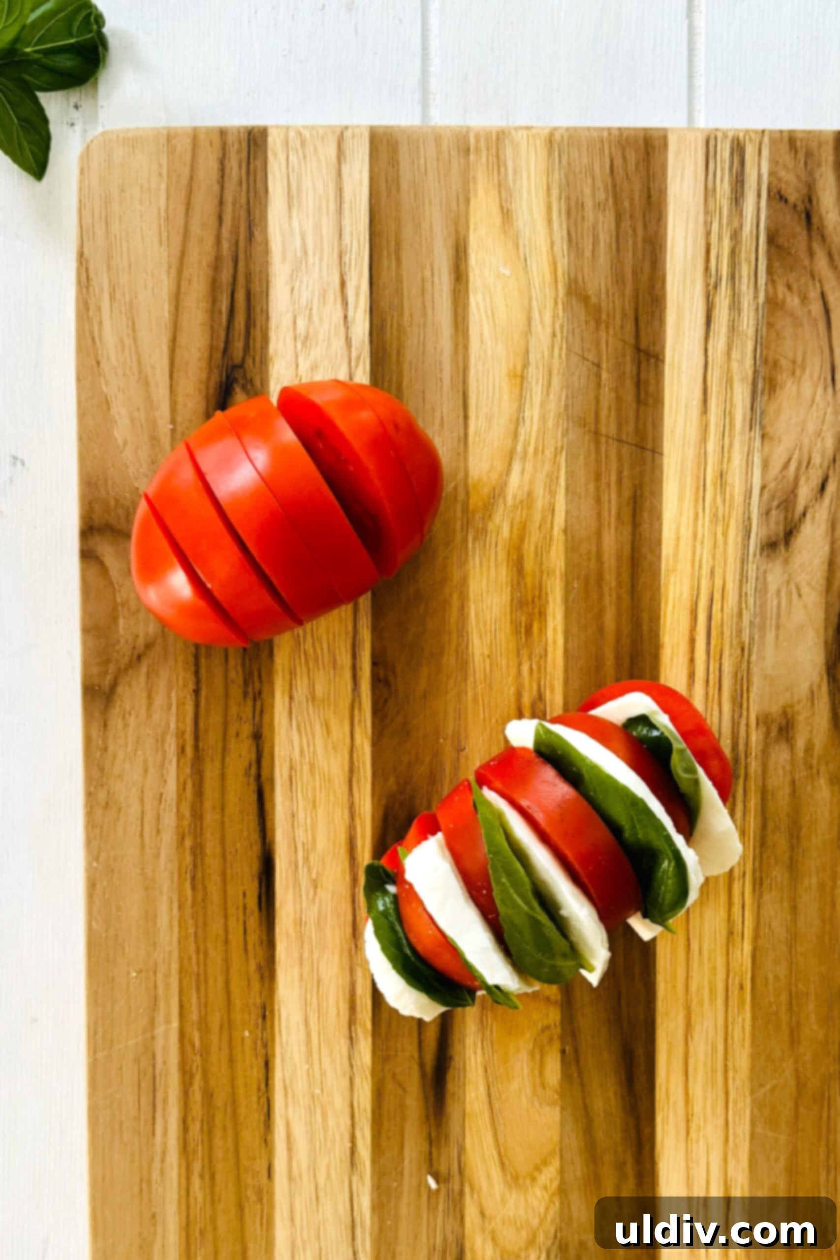 Caprese Stuffed Tomatoes 5 sliced tomato and mozzarella stuffed tomato.