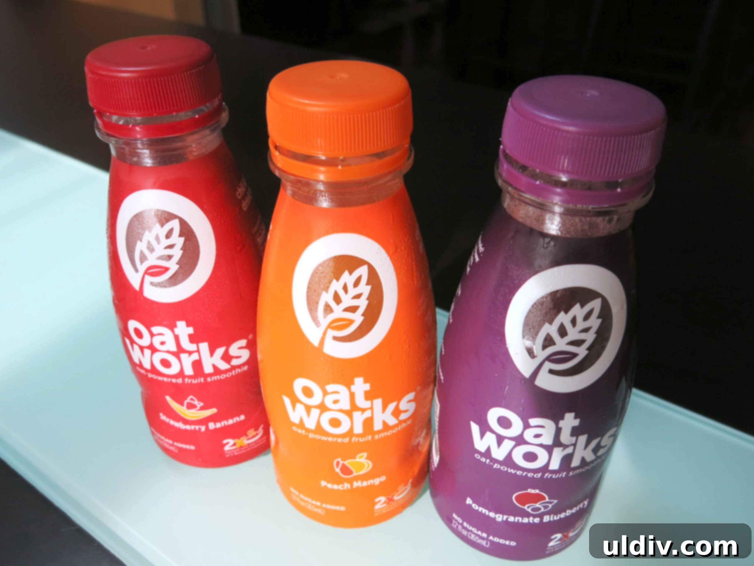 Oatworks Smoothies and Paninos The Recipe for a Healthy Lunch My Review 3 Three bottles of Oatworks smoothies, showcasing the different fruit flavors and healthy appeal.