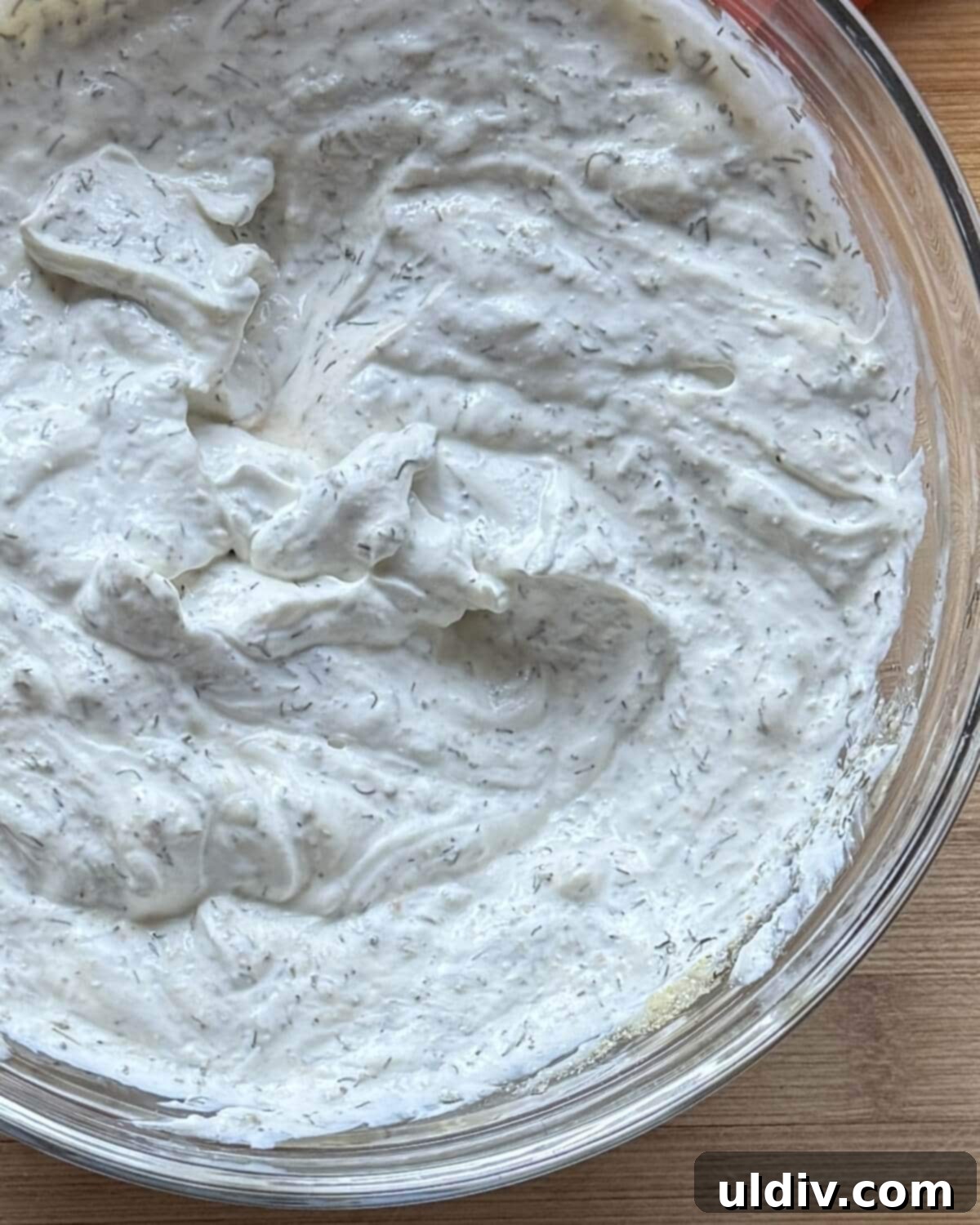 Easy 5-Minute Dill Dip 8 A beautifully textured bowl of creamy herb dip, ready to be chilled and served, showcasing its enticing consistency.