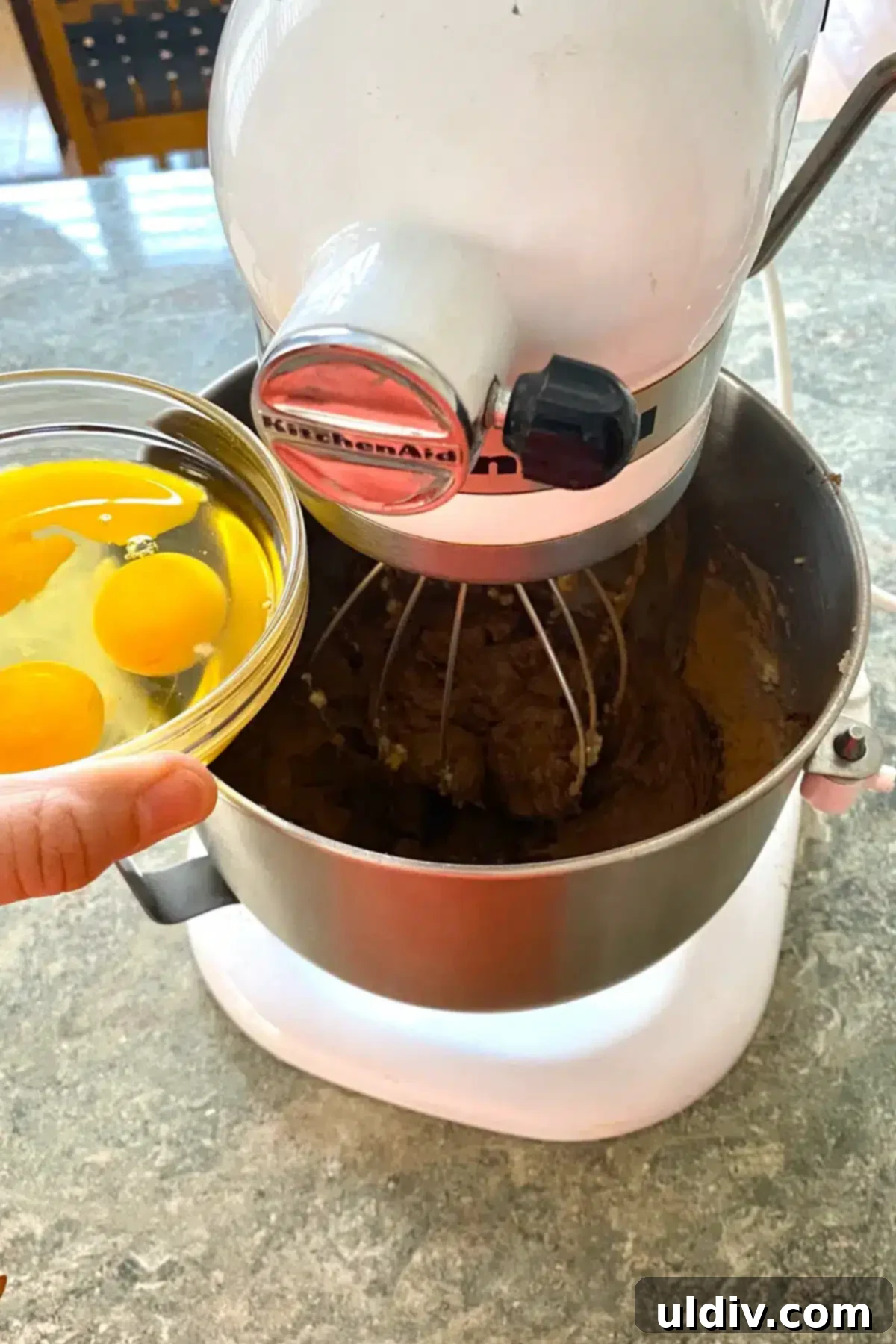 The Ultimate French Silk Pie Recipe Surpassing Bakers Square 7 adding eggs to pie filling.