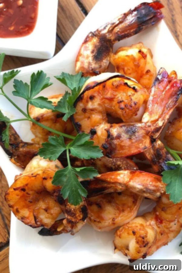 Sweet & Spicy Korean BBQ Shrimp Recipe 2 appetizer size plate with Asian shrimp