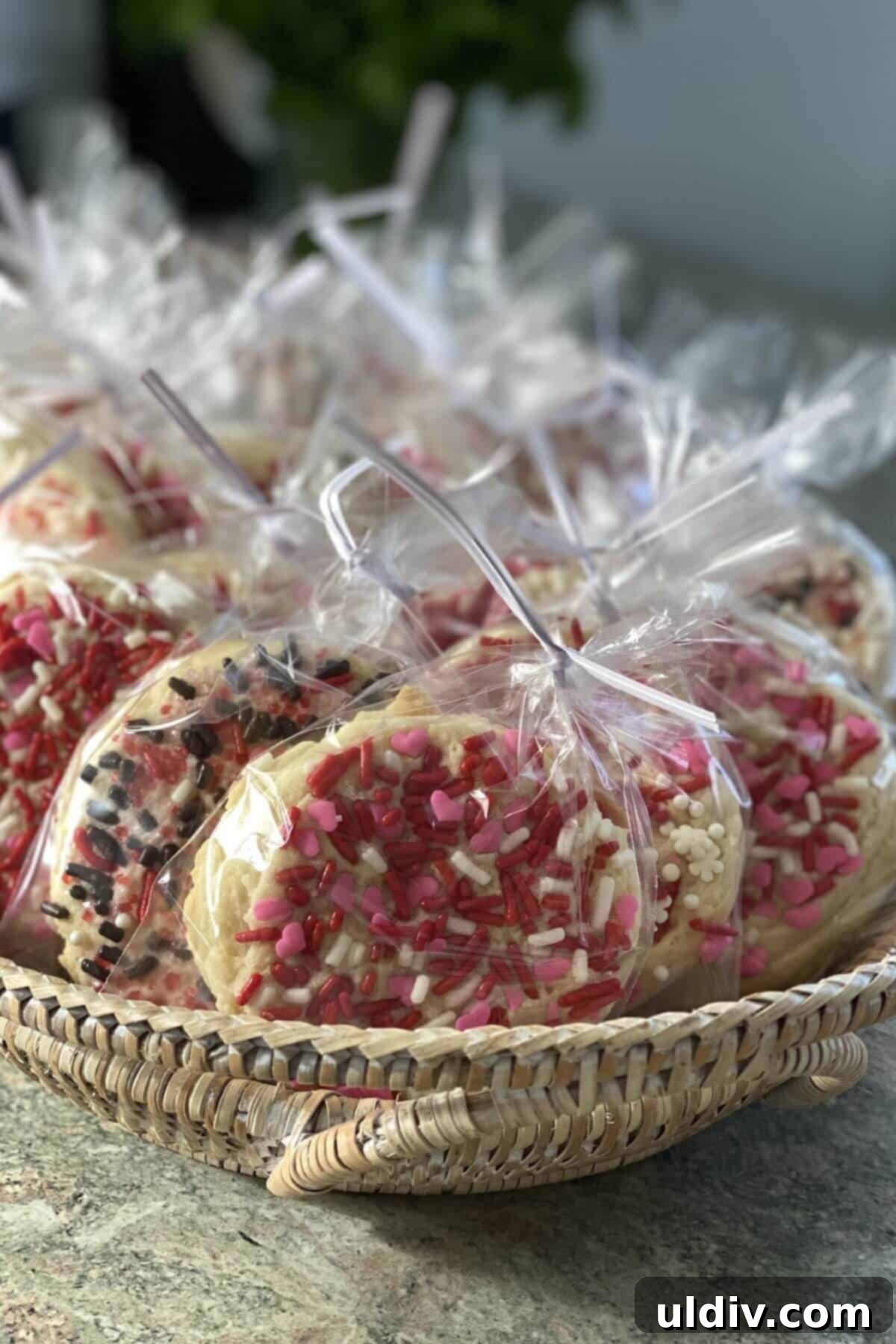 Individually wrapped almond butter chocolate chip cookies prepared for shipping in cellophane bags