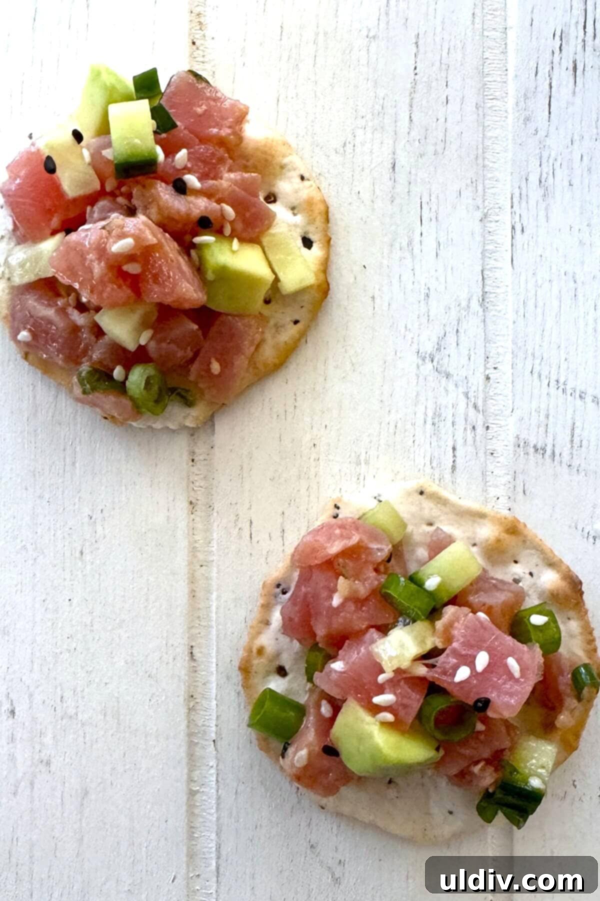Fast and Fresh Tuna Ceviche 3 Two water crackers topped with delicious raw tuna ceviche mixture.