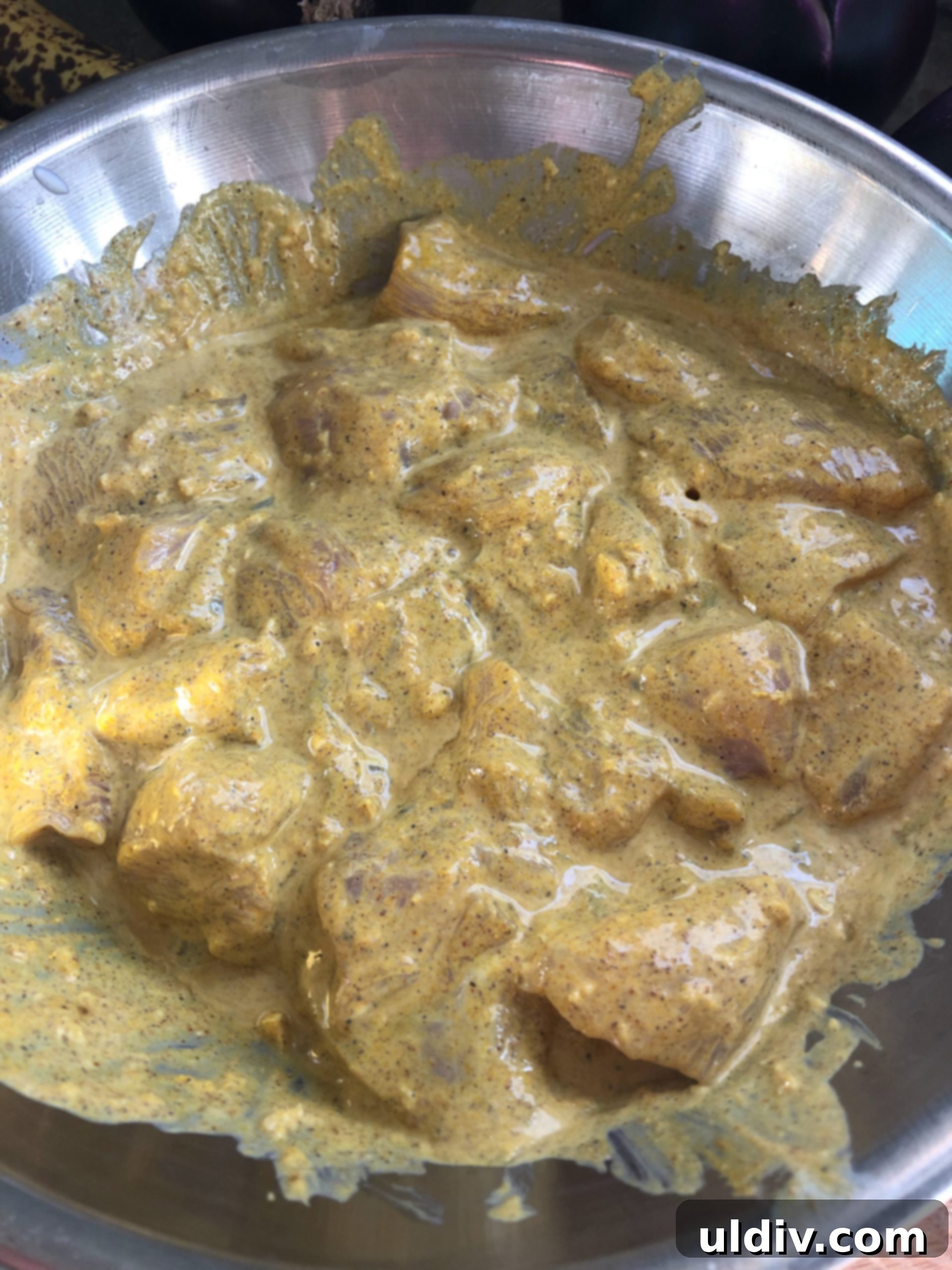 Velvety Butter Chicken with Fluffy Naan 3 Marinating chicken in yogurt for butter chicken.